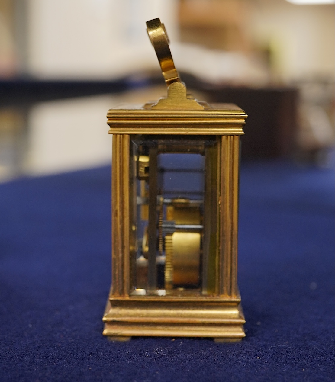 A miniature cased carriage timepiece, with key, 8.5cm high